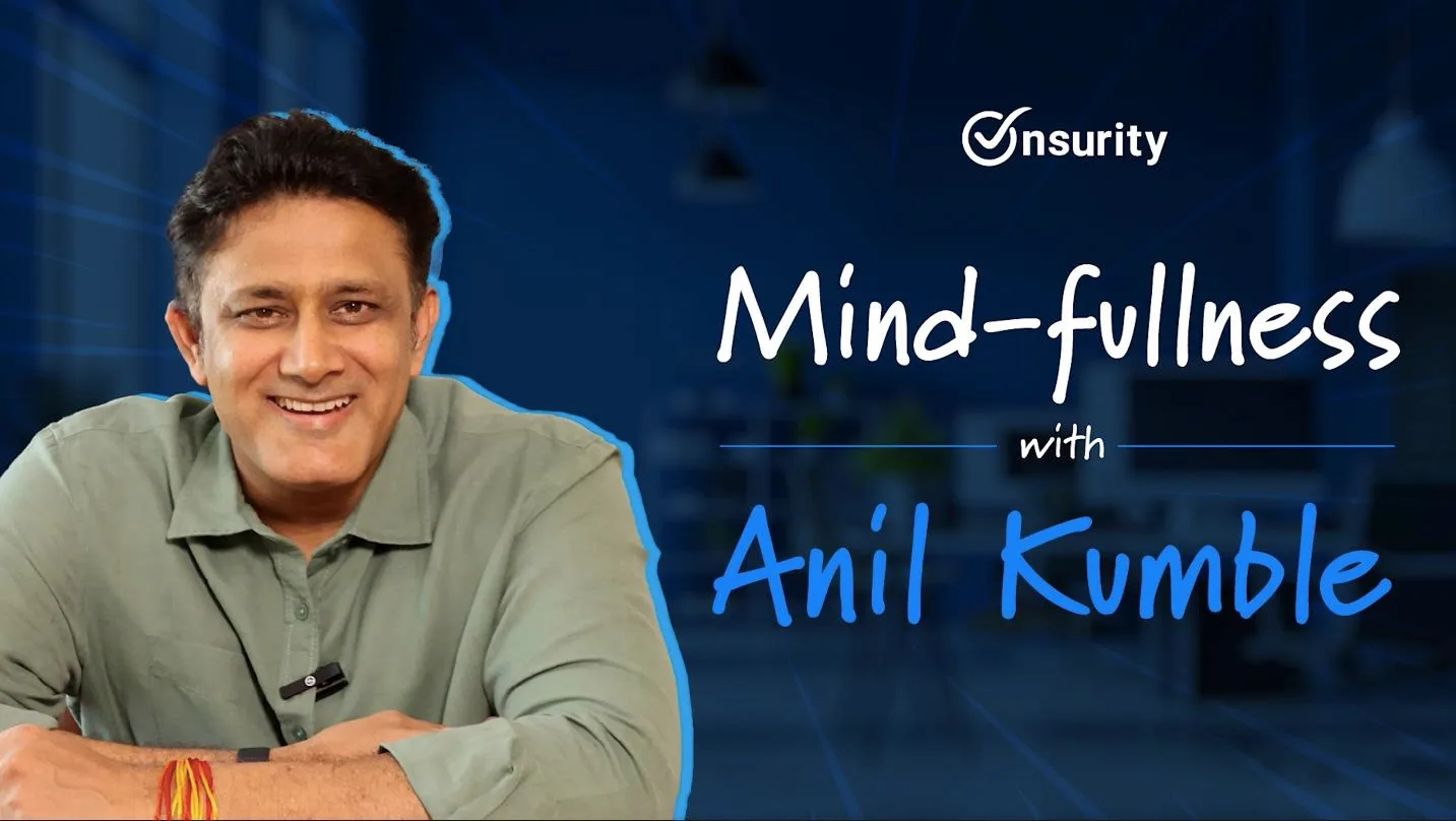 Widescreen campaign film thumbnail - cricketer Anil Kumble in an olive-green shirt with a lapel mic and a red-and-yellow thread on his wrist, arms folded and smiling, cut out with a cyan glow against a dark blue office backdrop; the right side carries the Onsurity logo above handwritten-style titles reading 'Mind-fullness with Anil Kumble'